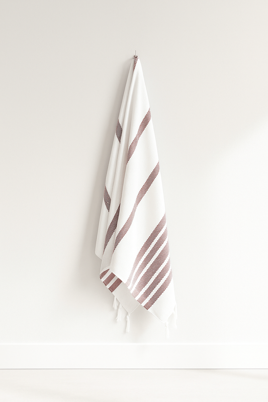 100% Cotton | Super-Soft Turkish Bath and Beach Towel in Red (hanging on a wall)